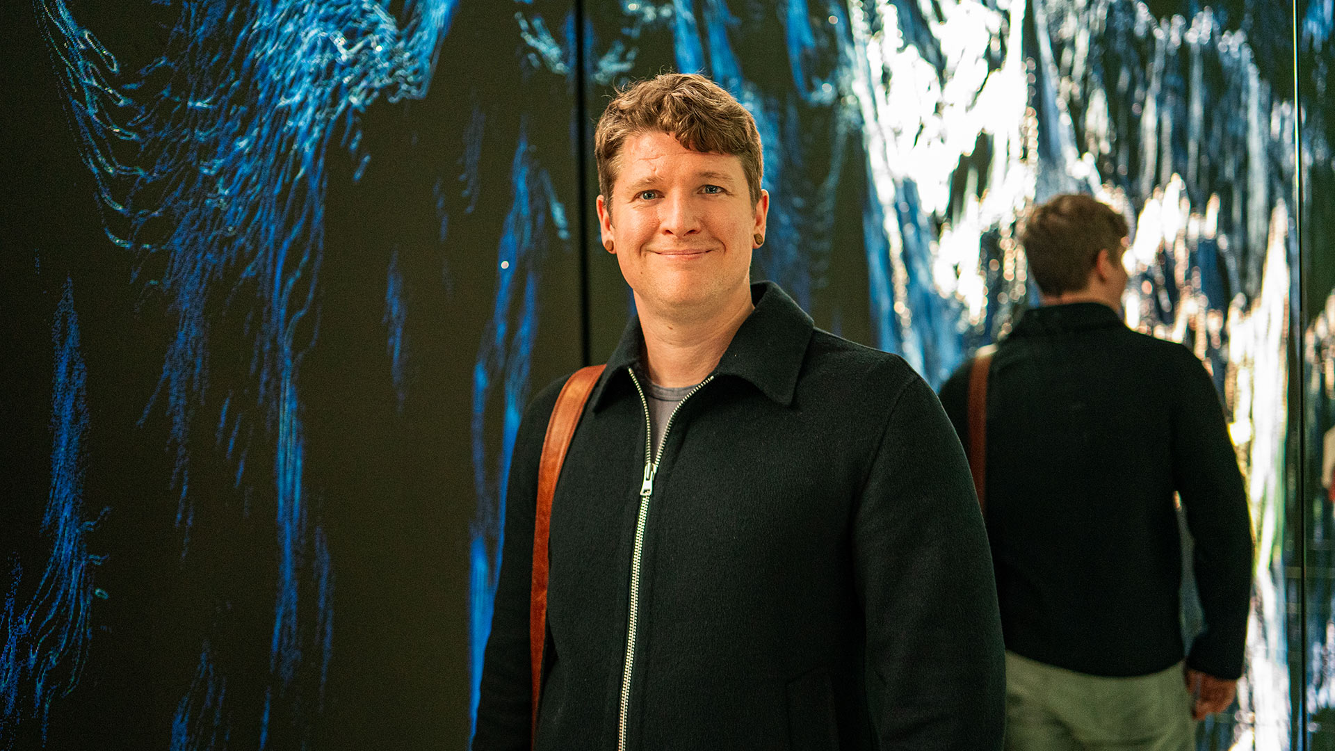 Hiking in New Zealand's south island A photo of me at an exhibition